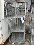 Two Mobile Caged Storage Racks, with three shelves sloping, approx. 0.9m x 0.75 x 1.85m high, lift
