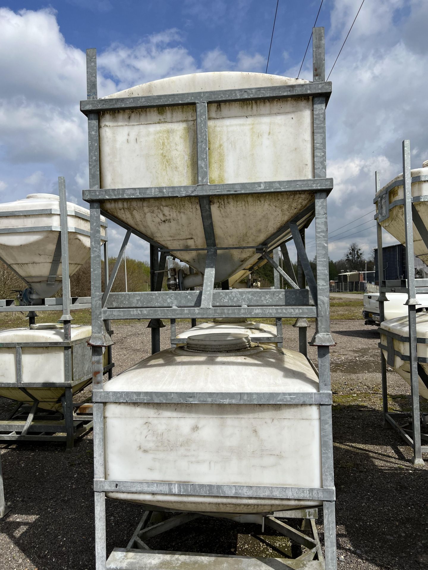 Four IBC Systems Frames, with plastic containers (some with outlet valves fitted), 750 litre - Image 3 of 3