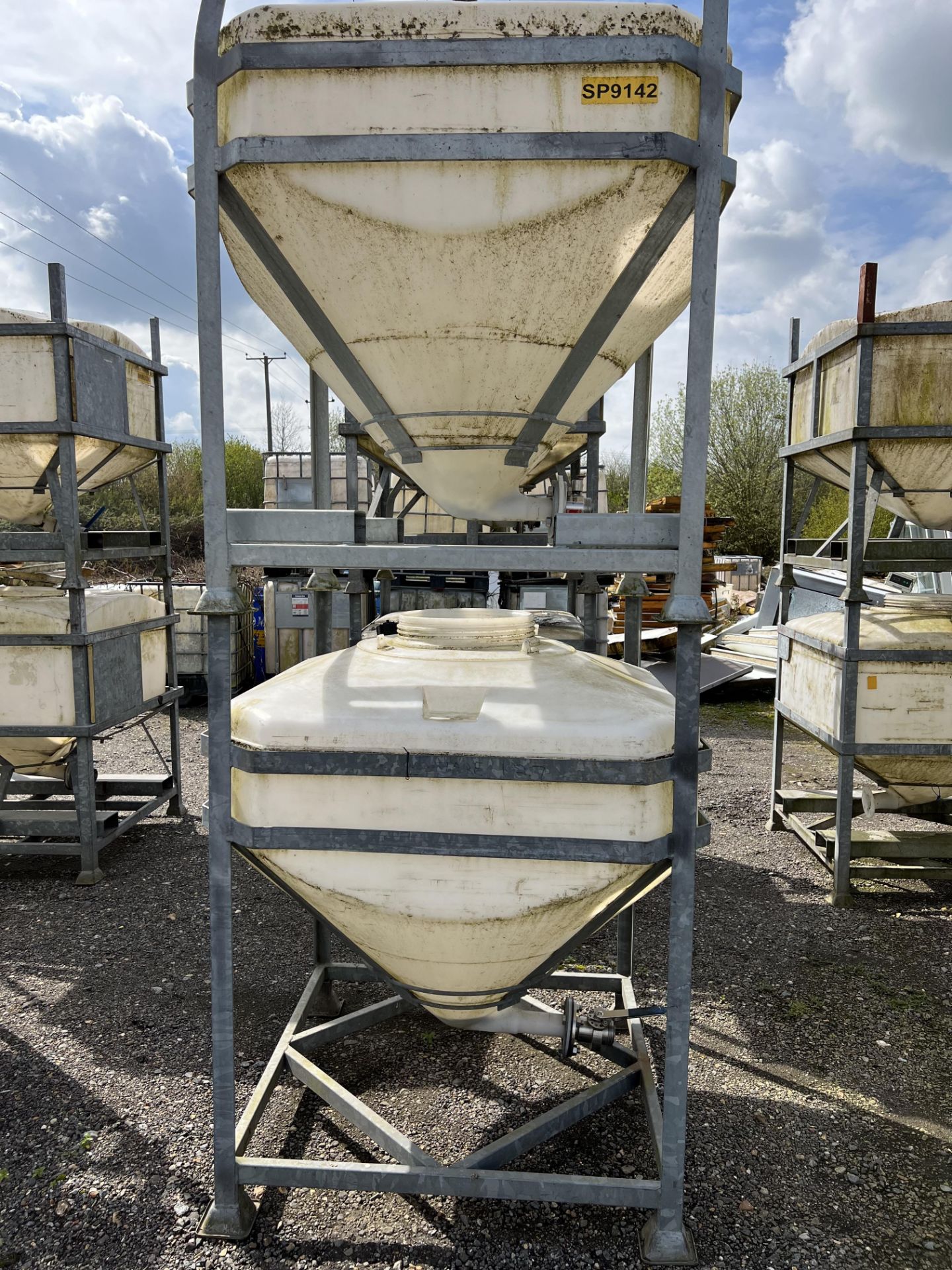 Four IBC Systems Frames, with plastic containers (some with outlet valves fitted), 750 litre - Image 4 of 4