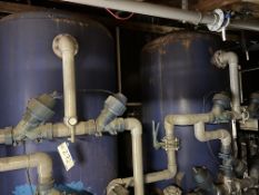 Three Iron Removal Tanks (two metal and one plastic), with various valves and pipework, each tank