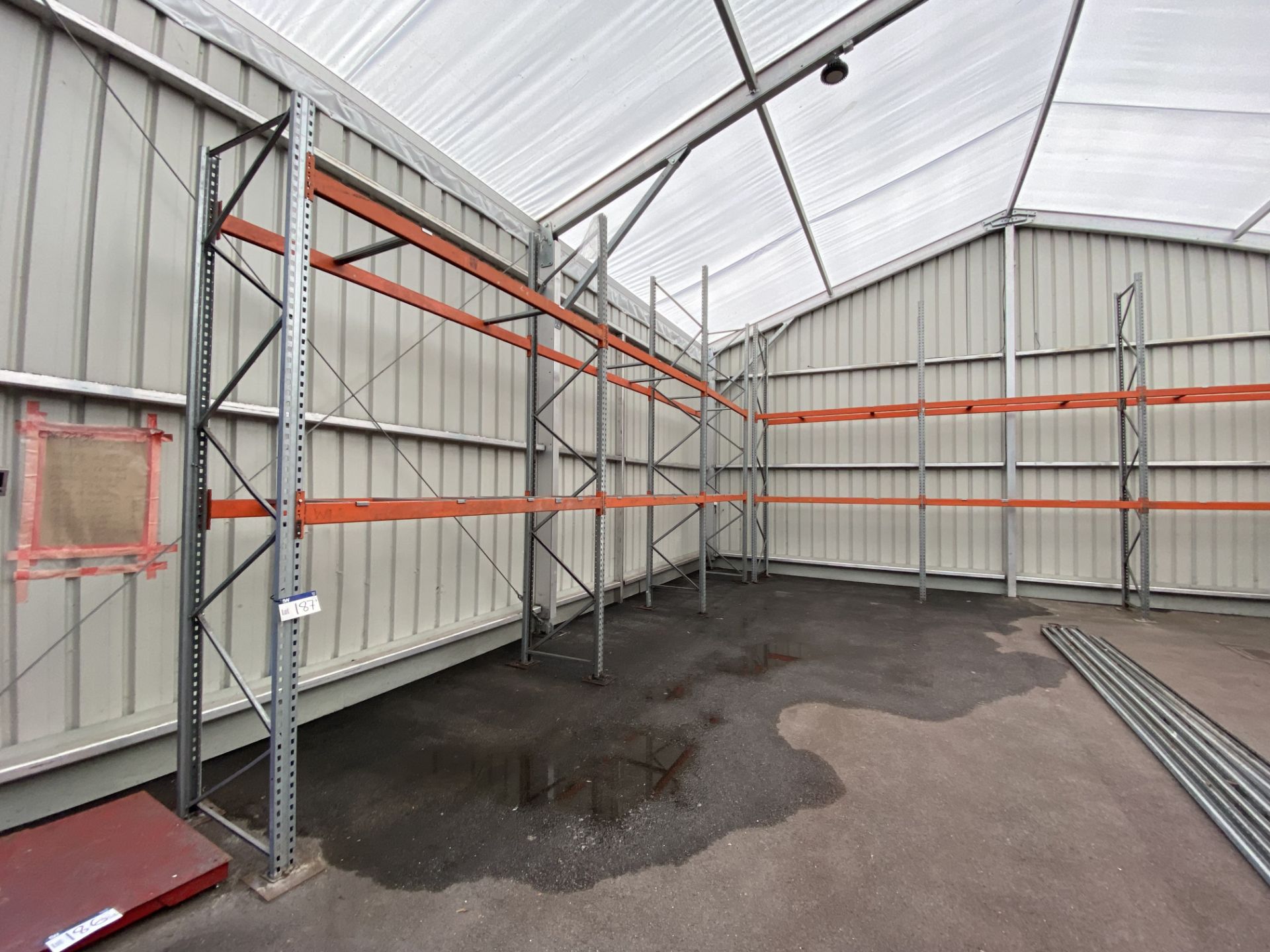 FOUR MAINLY GALVANISED STEEL PALLET RACKS, comprising three x three bay x two tier and one x