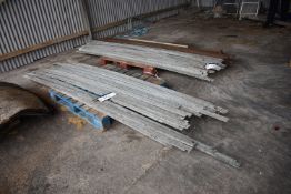 Galvanised Grid Support Bars, as set out on three pallets, ranging from 1.5m up to 2.7m long (cast