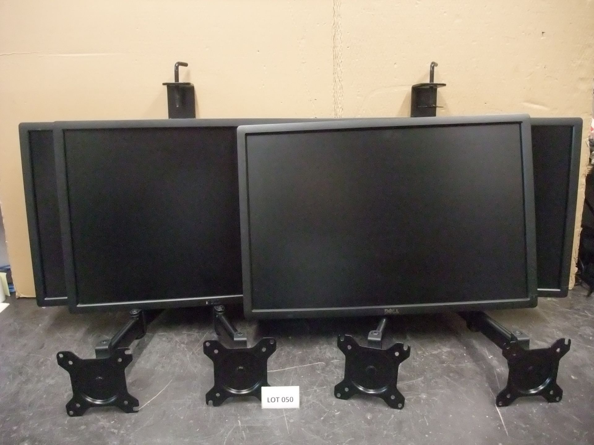 Four Dell U2412 24in. Monitors, with two twin deskmount monitor armsPlease read the following