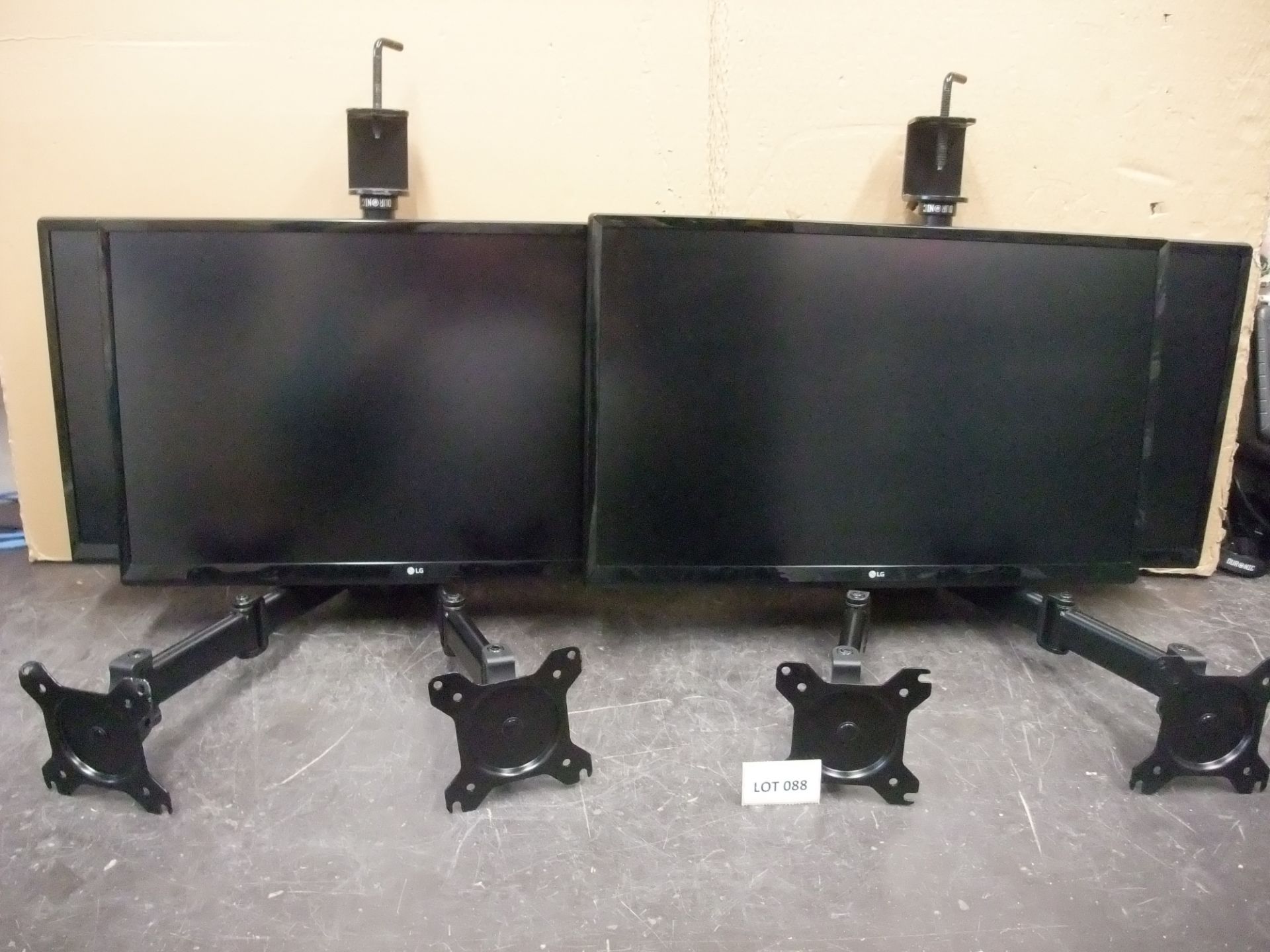 Four LG 24UD58-B 24in. Monitors, with two twin deskmount monitor armsPlease read the following