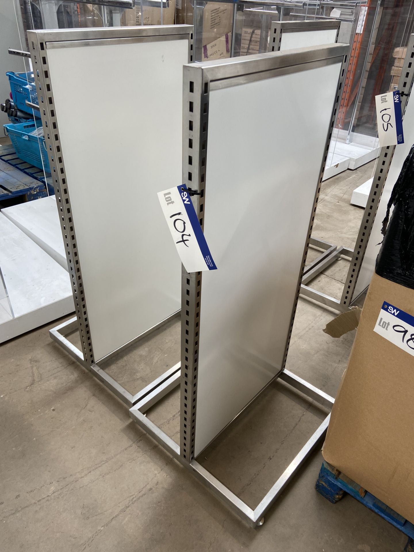 Two Stainless Steel Framed Double Sided Stands, each 620mm wide, Lot located 33-37 Carron Place,