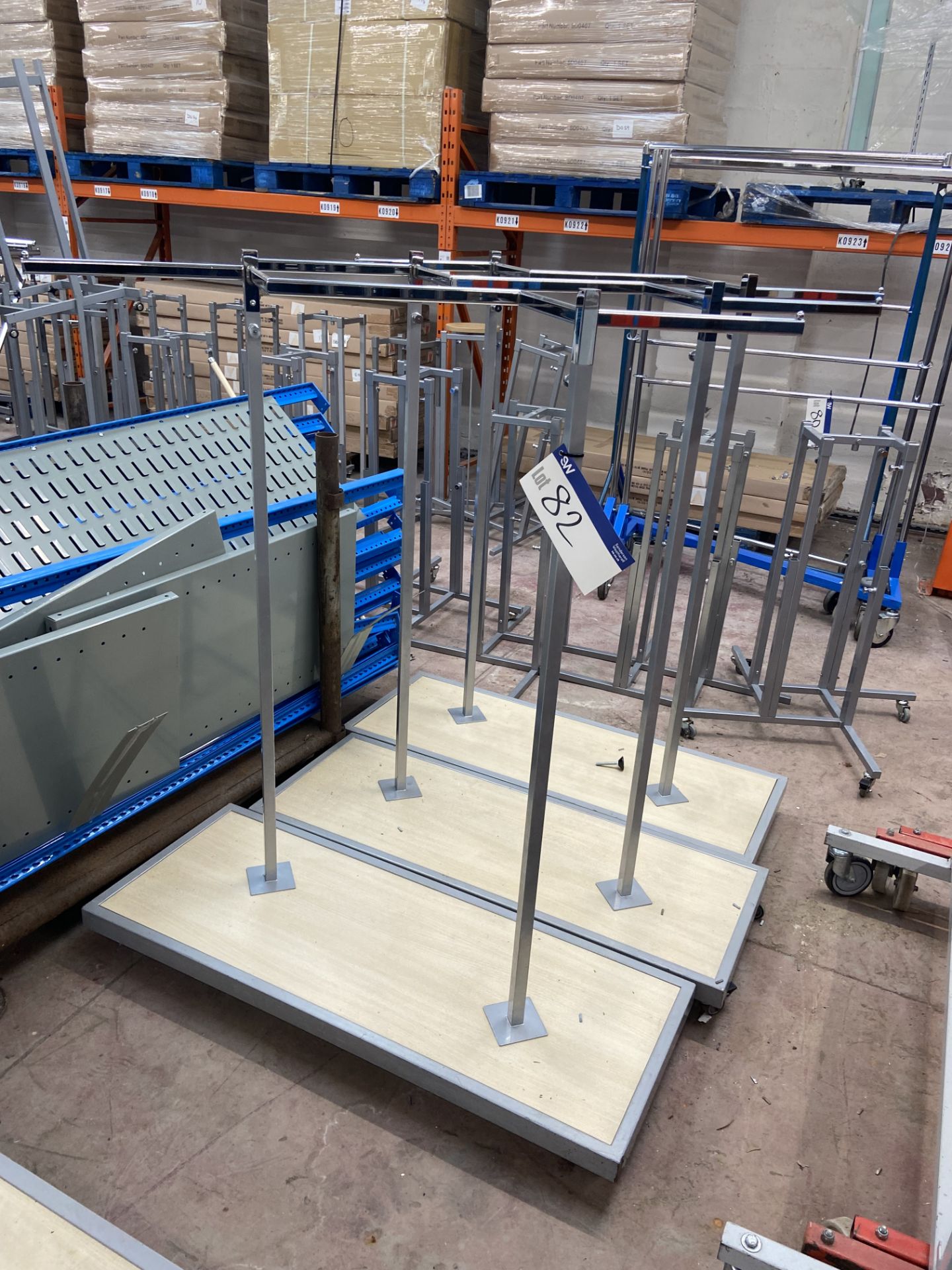 Three Mobile Garment Display Stands, each approx. 1.25m long, Lot located 33-37 Carron Place, East