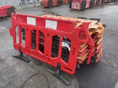17 Plastic Safety Barriers, with feet, each approx. 2m x 1m (lot located at Thorntrees Garage, Wigan