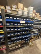Quantity of Zinc Washers & Locking Nuts, with plastic stacking bins, as set out on one bay of