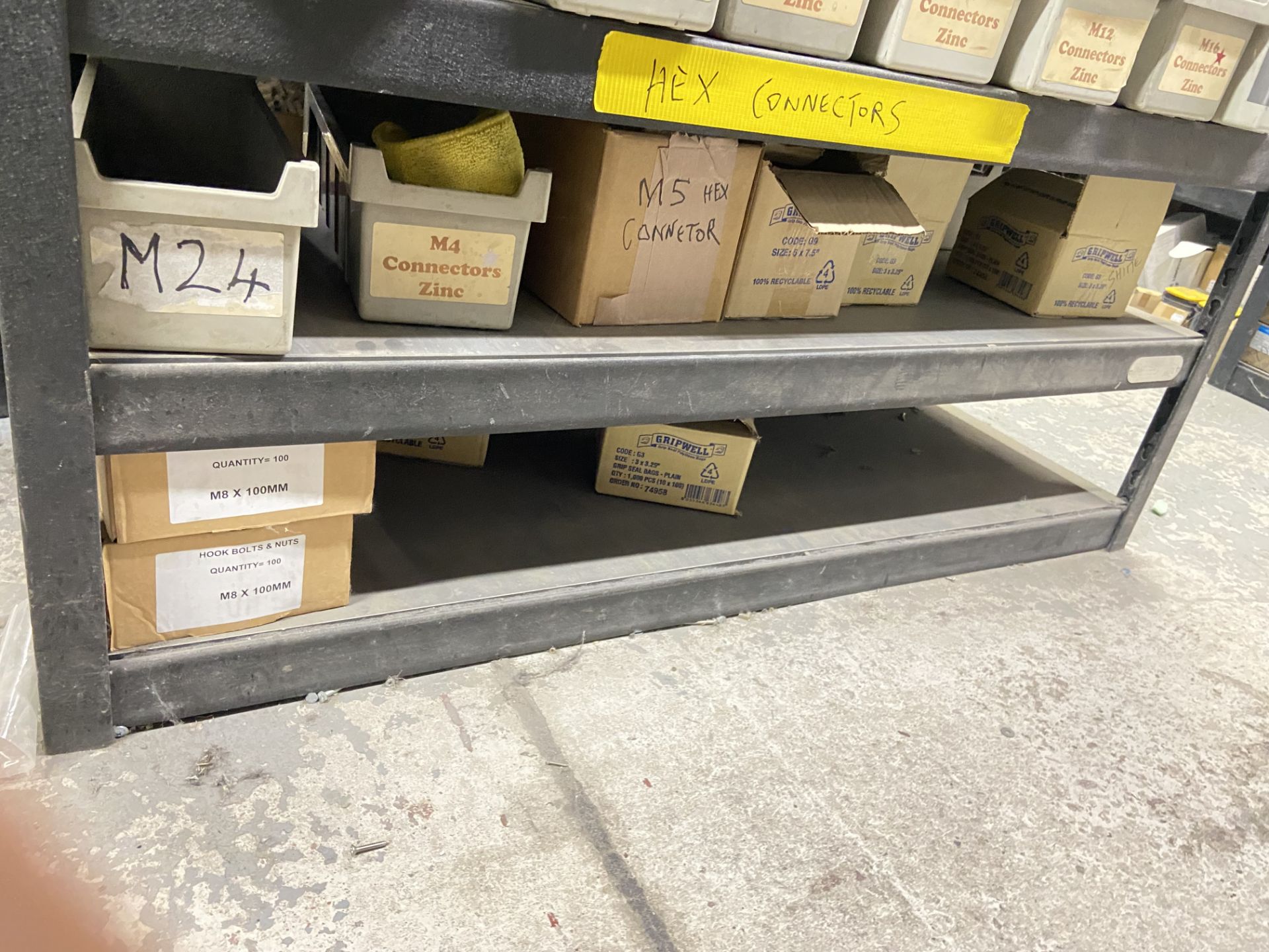 Quantity of Yellow Zinc J Bolts, with zinc connectors and plastic stacking bins, as set out on one - Image 4 of 4