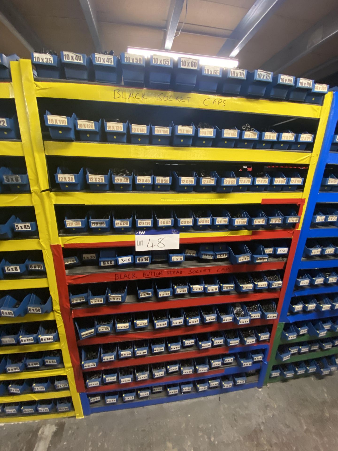 Quantity of Self Colour All Black Socket Caps & Buttons, with plastic stacking bins, as set out on