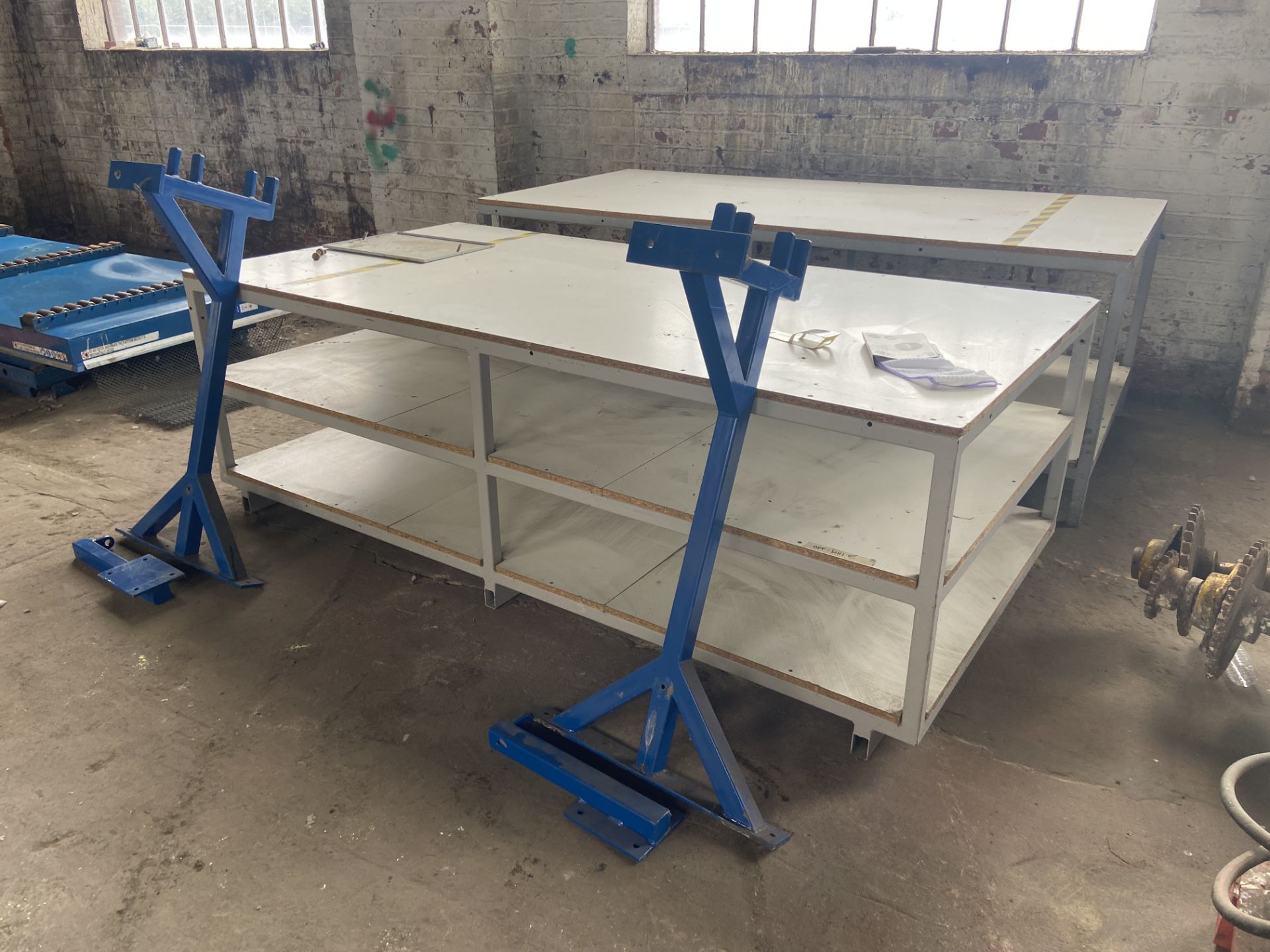 Approx. 16 Steel Framed Two/ Three Tier Benches, up to approx. 2.45m x 1.22m, with roll dispensing