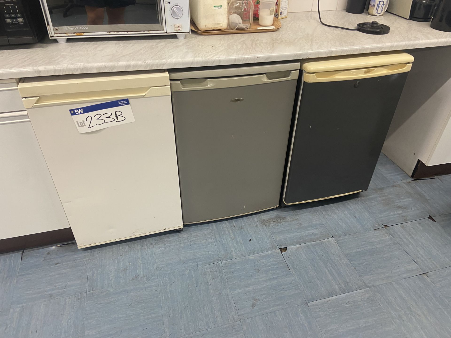 Three Single Door Refrigerators, with two microwaves, coffee machine, kettle and toaster Please read