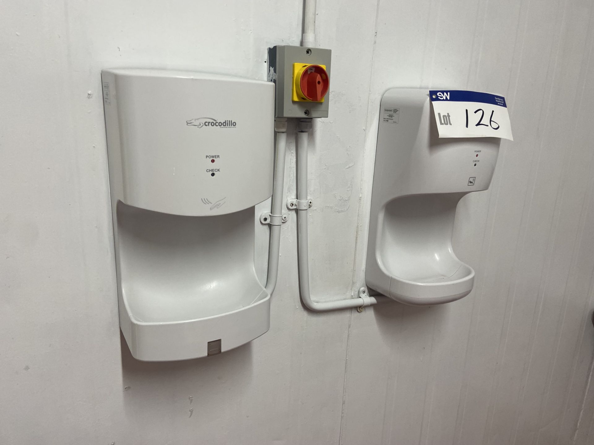 Two Crocodillo Wall Mounted Electric Hand Drying Units, with two soap dispensers and PPE wall