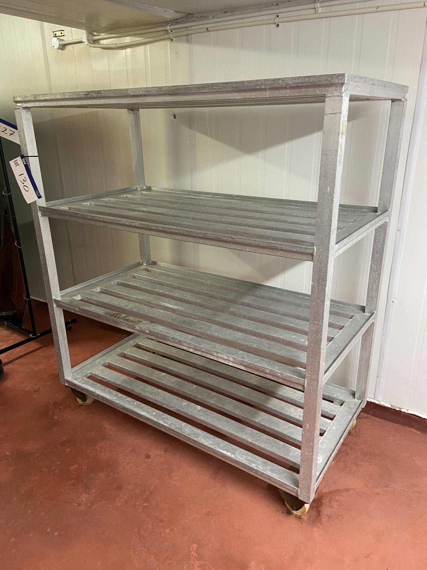 Four Tier Mobile Alloy Rack, approx. 1.52m x 760mm x 1.6m high Please read the following important