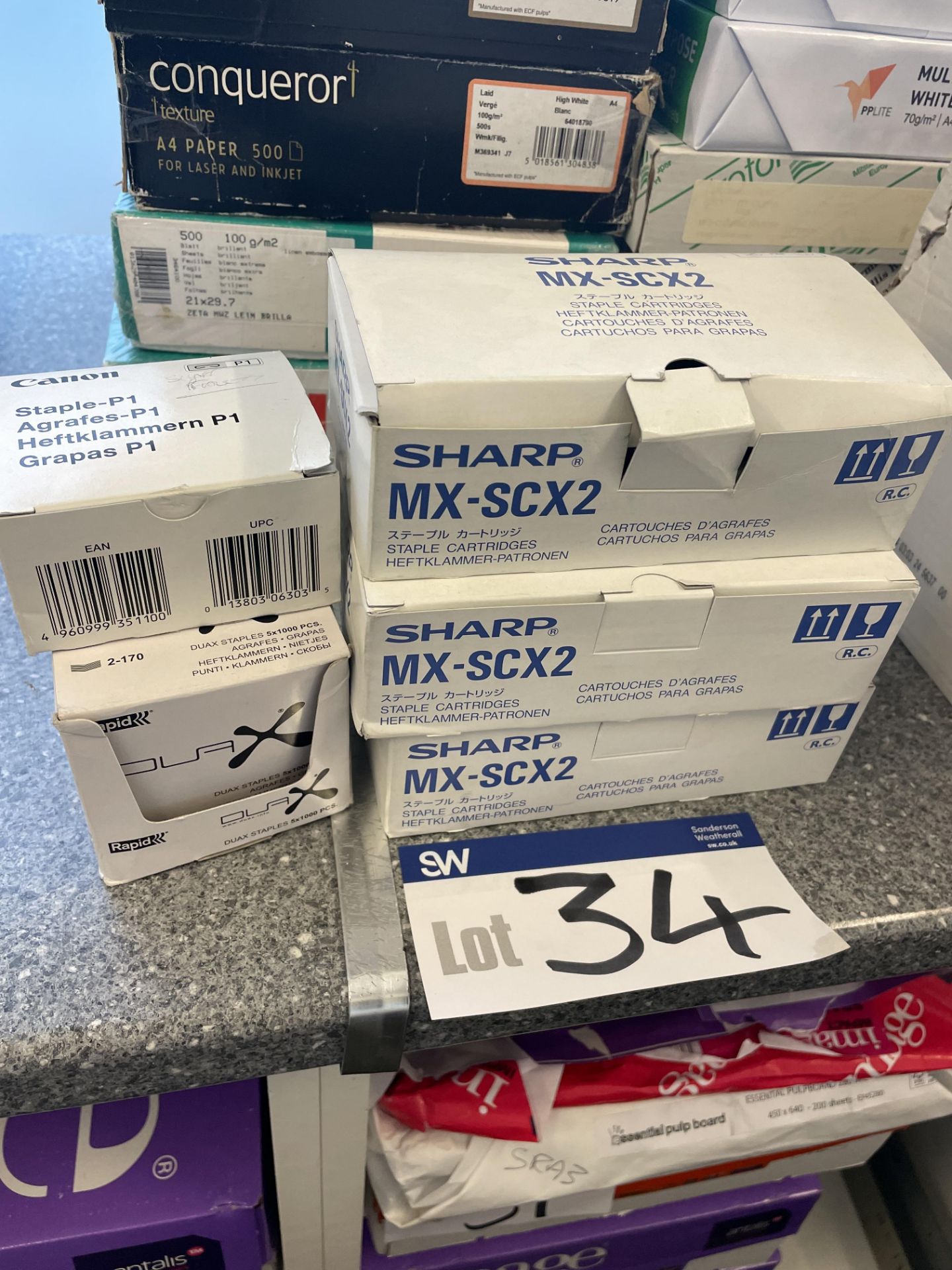 Five Boxes of Various Staples Including Canon, Rapid and Sharp MX-SCX2 Staple Cartridges Please read