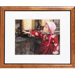 Tibetan Child Spinning a Prayer Wheel, Photograph