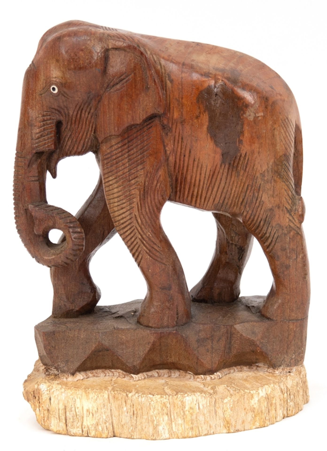 Figur "Stehender Elefant", Ebenholz, geschnitzt, auf versteinerter Holzplatte, Gebrauchspuren, Ges.