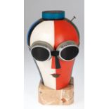 "Kopf 58 mit Schutzbrille und Nagel", suprematistisch, 1950er Jahre, Pappmaché, polychrom gefaßt, H