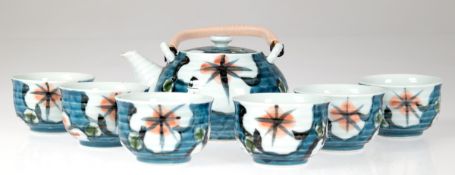 Teeservice, 7-teilig, Japan, Keramik, polychrome Floralmalerei, horizontal geriffelte Wandung, best