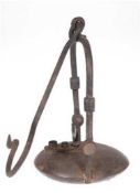 Grubenlampe, um 1900, Eisen, flacher runder Korpus mit übergreifendem Bügel am Haken, H. 39 cm (mit