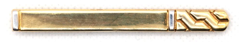 Krawattenklammer, 585er GG/WG, z.T. Ornamentdekor,  7,27 g, 0,7x6,7 cm