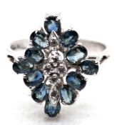 Ring, Silber geprüft, blaue Topase und weiße Spinelle, um ca. 1970 /80, Maße des Ringkopfes ca. 1,9