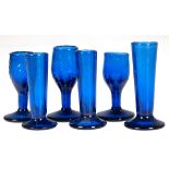 6 diverse Schnapsglaser, Blauglas, z.T. mit Abriß, H. 8,5 cm - 10 cm