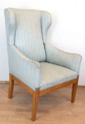 Ohrenbacken-Sessel, Ende 19. Jh., Buche, hellgrün gestreifter Bezug, Gebrauchspuren, 119x80x84 cm