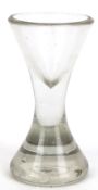Schnapsglas, 18. Jh., dickwandiges Klarglas mit Abriß, eingeschlossene Luftblasen, H. 12 cm