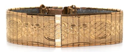Armband wohl um ca.1920, Golddouble mit aufwendigem Dekor, mit Sicherheitskette, Länge ca. 17,7 cm