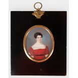 Miniatur "Porträt einer Dame im roten Kleid", 19. Jh., hinter gewölbtem Glas, im schwarzen Rahmen (