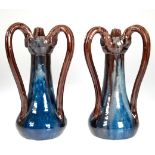 Paar Jugendstil-Vasen, Keramik, gemarkt "LSV", braun/blaue Laufglasur, gebauchter Korpus mit 3 Henk