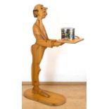 Holzfigur "Buttler mit Tablett", Weichholz, z.T. bemalt, auf ovalem Stand, 109x25x52 cm