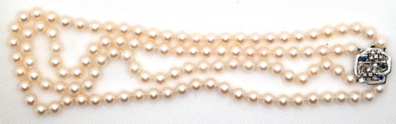 Perlenkette, 2-strängig, punziert JKa, Perlen-Dm. 7 mm, 585er WG-Schließe besetzt mit 12 Brillanten