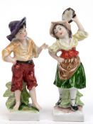 Paar Porzellan-Figuren "Tamburin-Spielerin" und "Straßenjunge", wohl Thüringen, polychrom bemalt, H