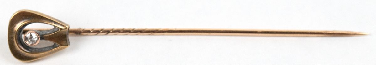 Krawattennadel, 585er GG, mit 1 Diamant besetzt, ges. 1,6 g, L. 6,9 cm