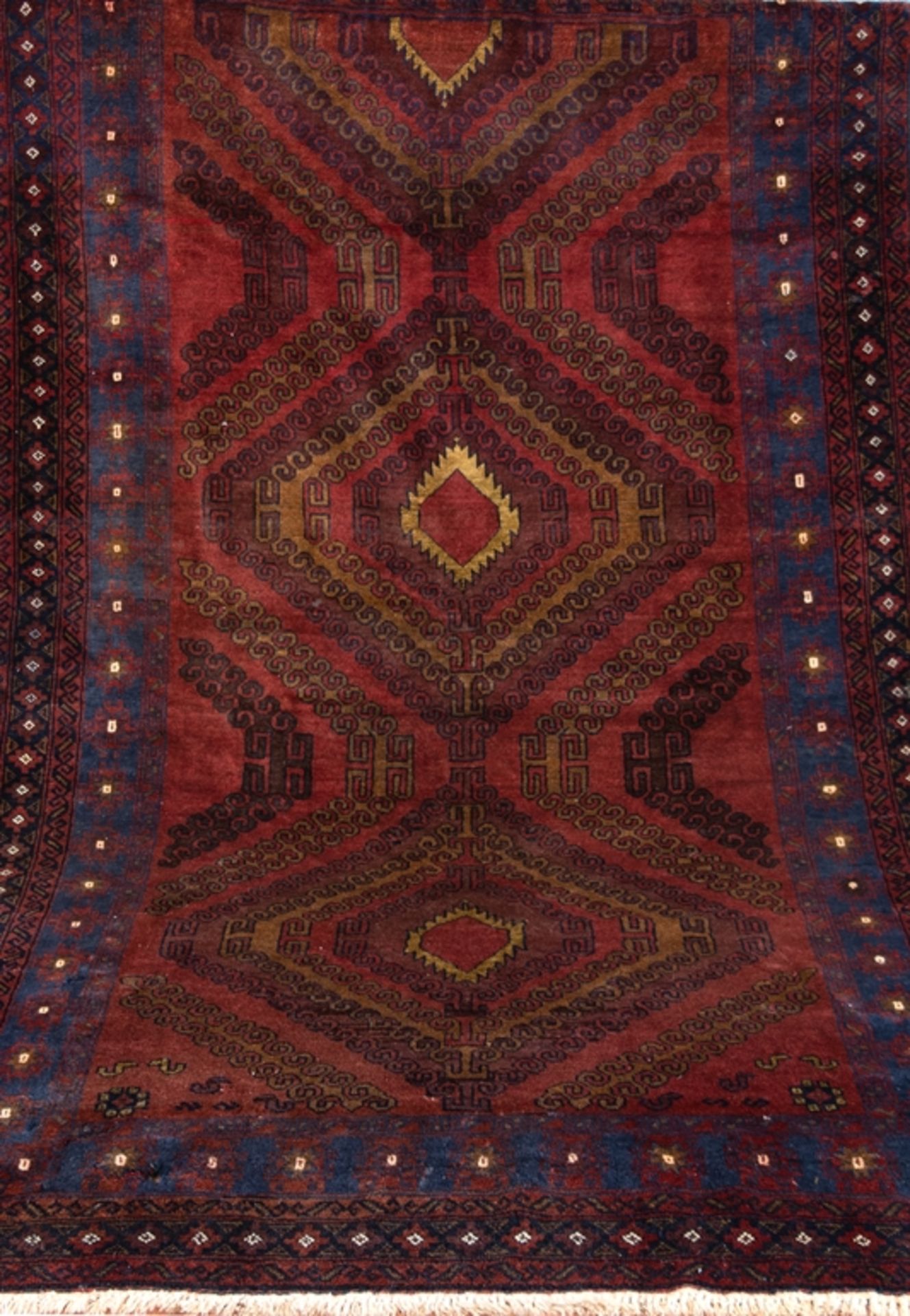 Teppich Persien, Wolle/ Wolle, Ornamentdekor auf dunkelrotem Grund, Eckbereich und Seiten mit mehre