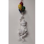 Decorative porcelain hanging wall plaque in the form of a Clown holding a bunch of balloons. H:68