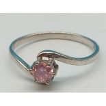 9ct white gold and pink stone set ring. Size N½. 1.5g. Shipping Group (A).