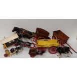 Assorted horse and cart figures, largest being 60cm in length. Collection only.