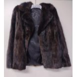 Ladies fur coat, size 12. Shipping Group (A).