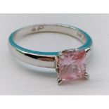 .925 silver and pink cubic zirconia set ring. Size: Q. Shipping Group (A).