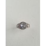 Silver solitaire and diamond set ring. Size Shipping Group (A).