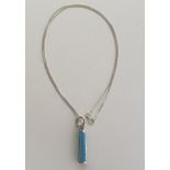 (2) .925 silver and turquoise pendants on chains. Shipping Group (A).