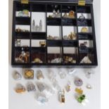 Collectors cabinet with quantity of assorted miniature trinkets. Collection only.