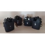 (4) pairs of binoculars: Prinz 10x50, Regent 8x40, Zenith Field plus 1 other. Shipping Group (A).