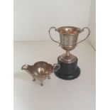 Silver sauce boat and double handed trophy, hallmarks for Sheffield and Birmingham. Shipping