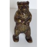 Metal money box in the form of a standing bear, H:15 cm. Shipping Group (A).