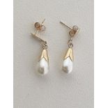 Pair of 9ct gold natural pearl teardrop earrings. Shipping Group (A).