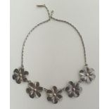 Silver daisy necklace. Shipping Group (A).